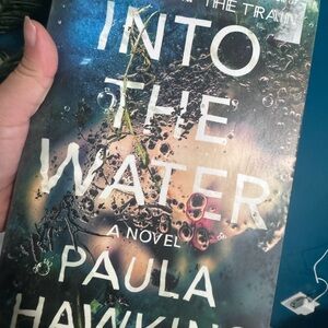 Into the Water by Paula Hawkins - Paperback Book, Dark Teal Cover